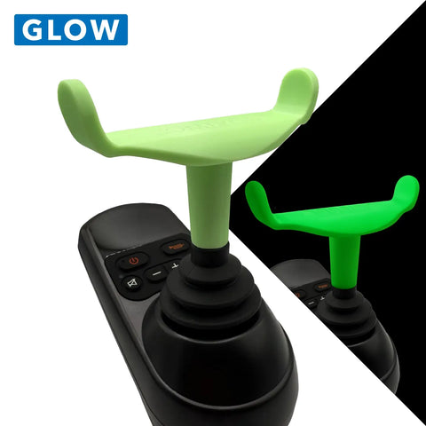 Control joystick with green handle on black base, glowing effect shown on white and black background.