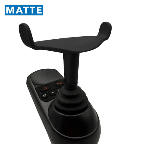 Black joystick controller with control buttons on a white background, featuring the word 'MATTE'.